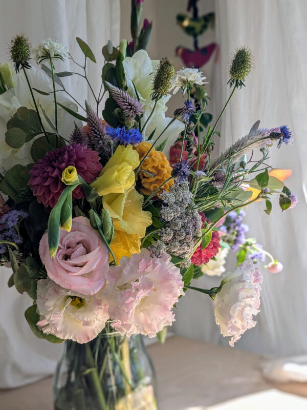 Colorful flowers in a vase.